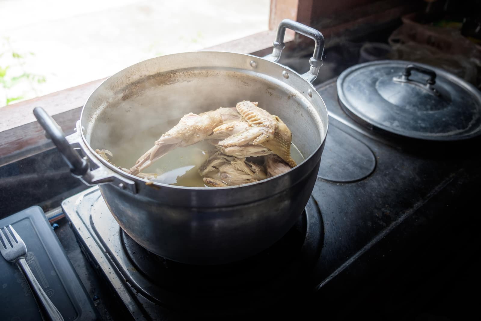 boiling in pot on stove