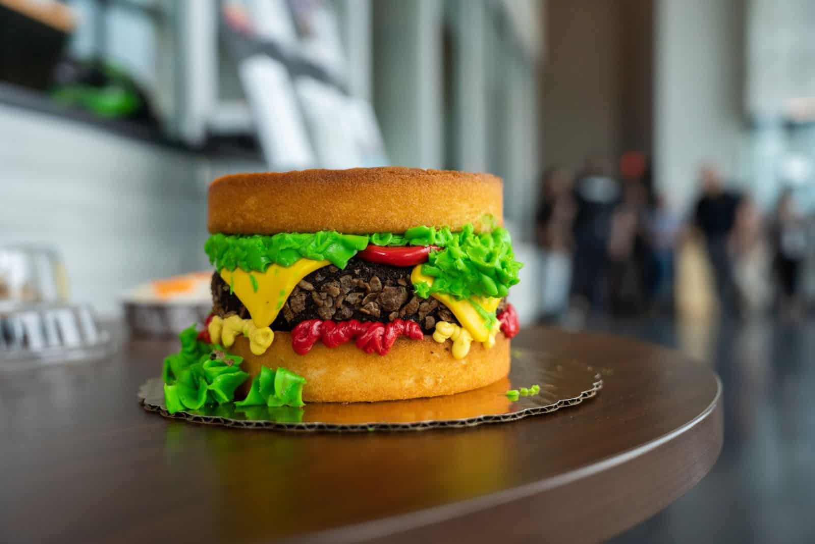 cake in shape of cheeseburger on the table