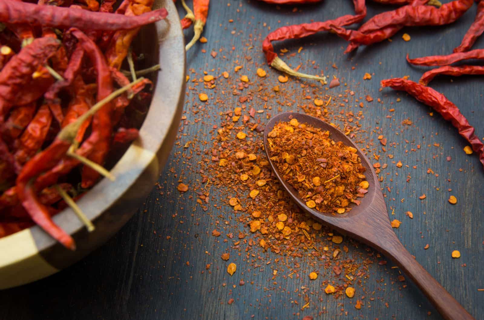 Cayenne pepper on the wooden floor