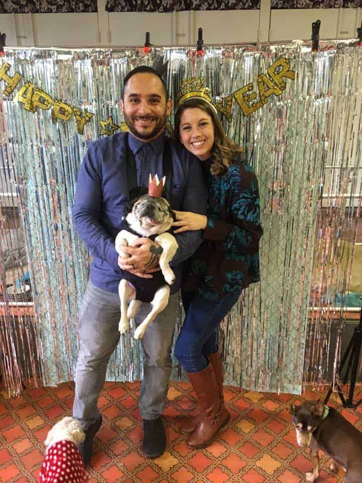 couple with dog celebrating birthday