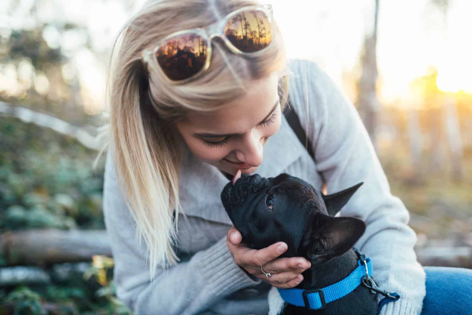 french bulldog breeders in ohio cuddling with dog