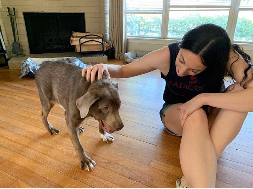 girl and her dog with rare condition