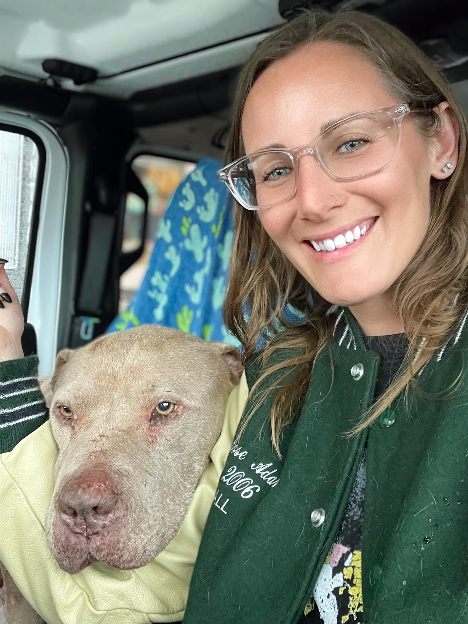 girl and her gray dog