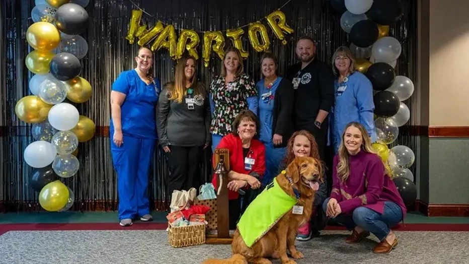 group of people and a dog