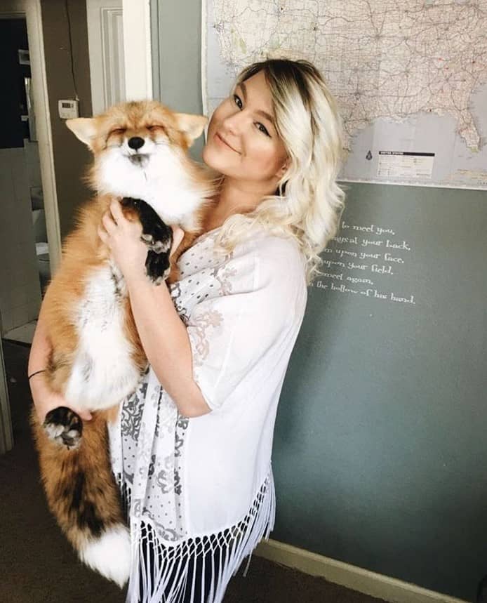 happy woman with fox