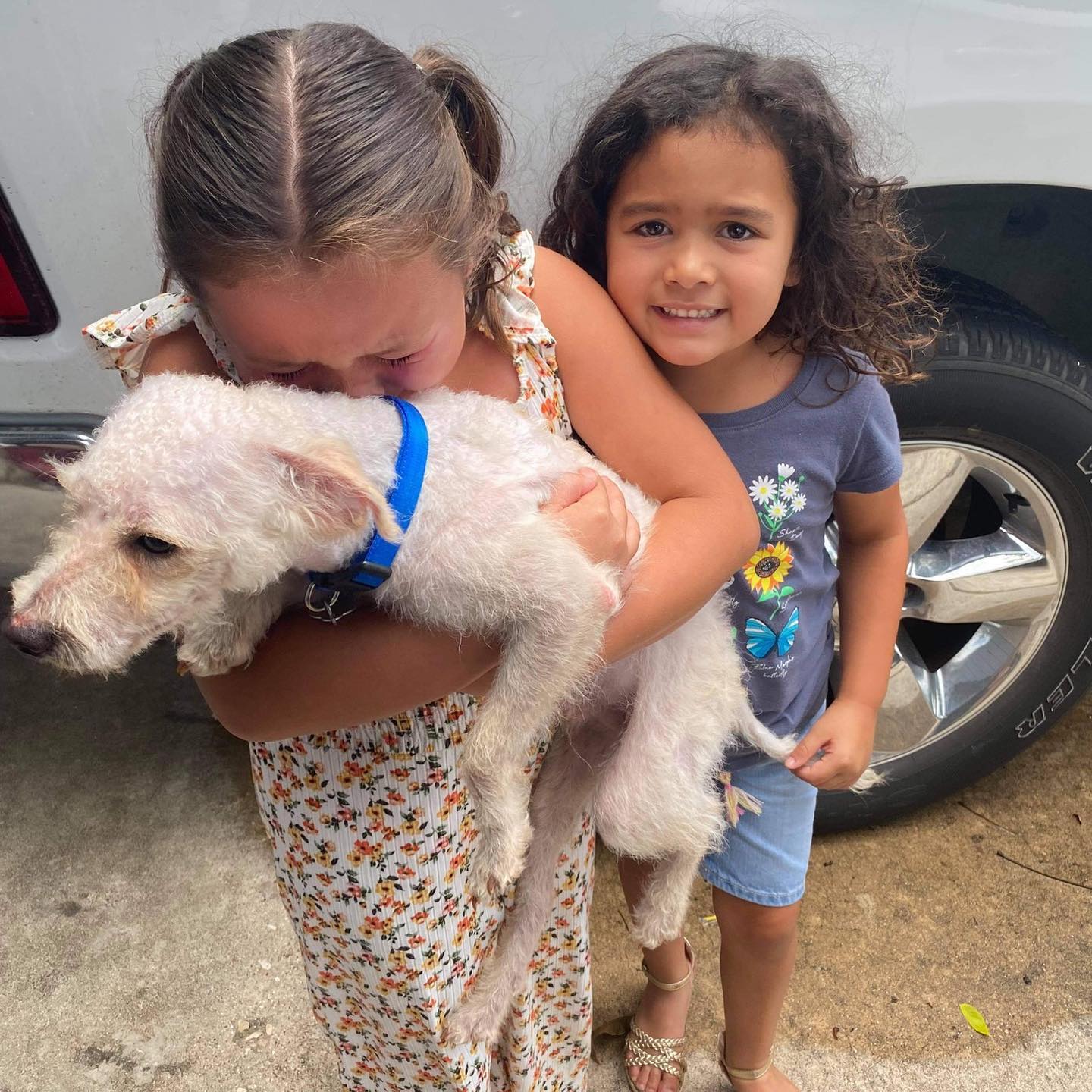 little girls with dog called max