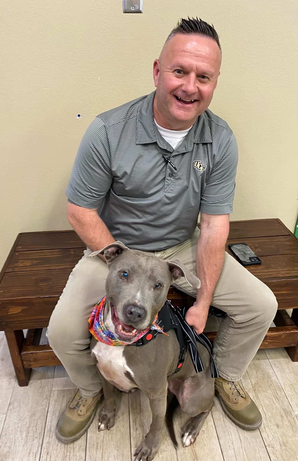 man and his dog smiling