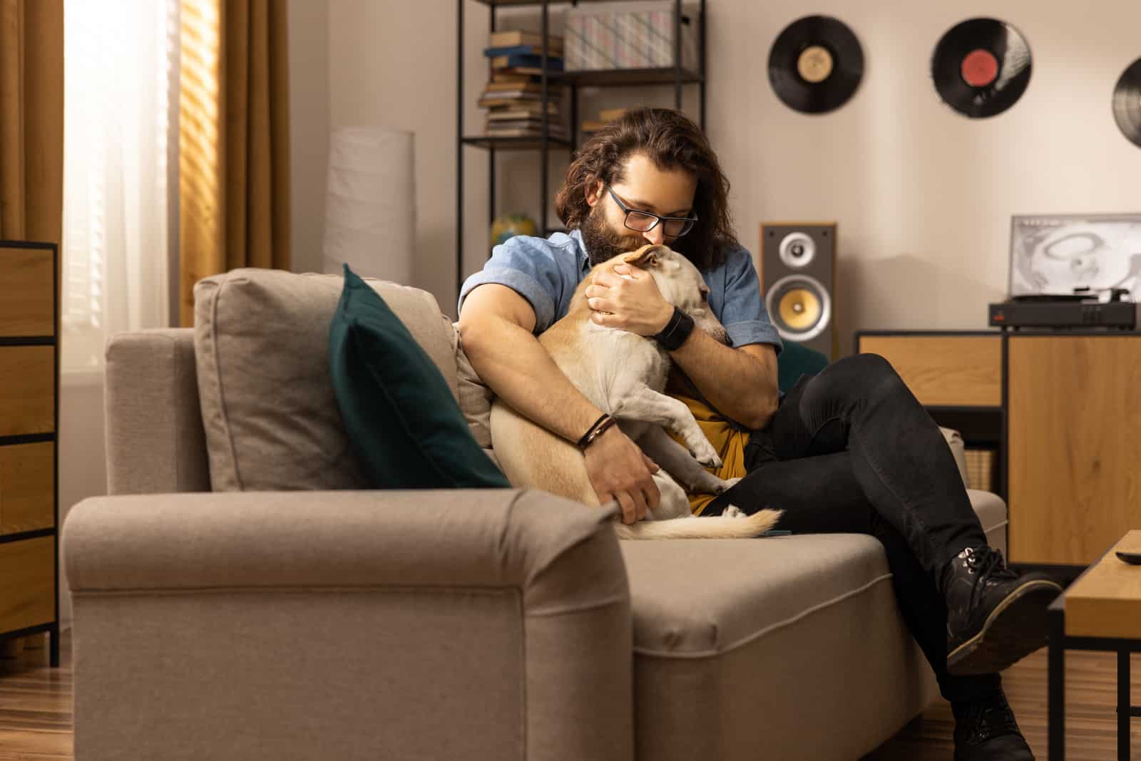 owner hugging his dog