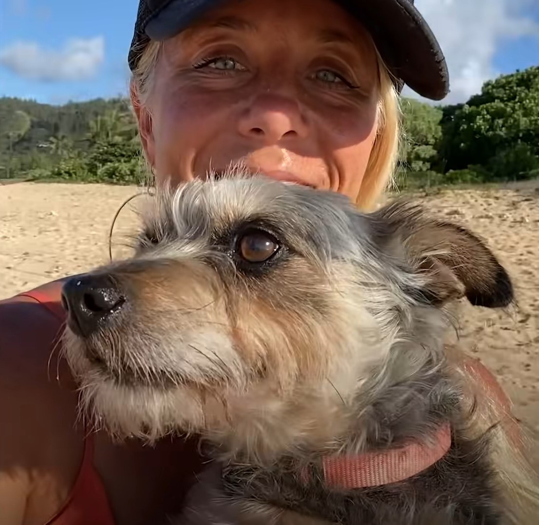 photo of a woman and a dog