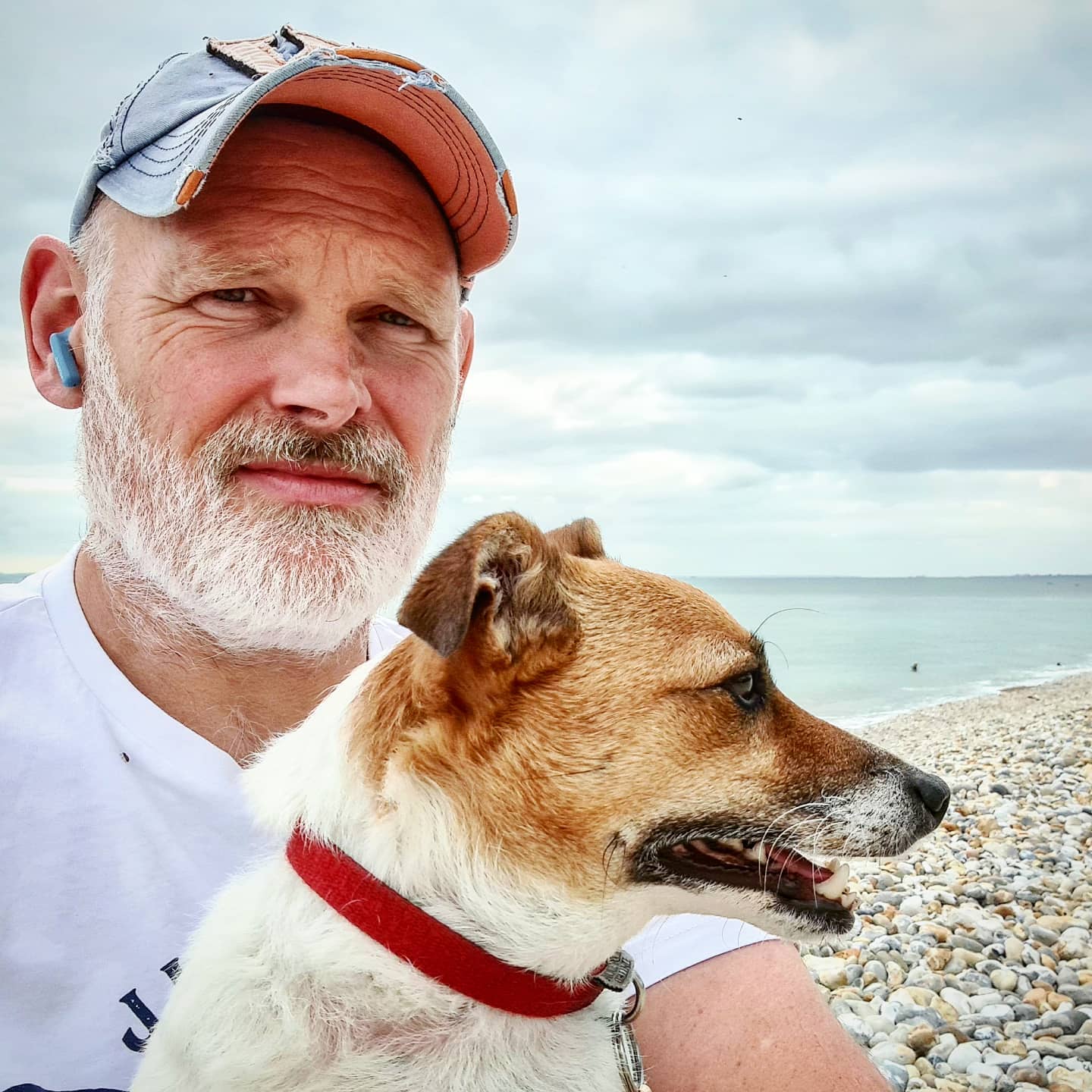 photo of man and a dog