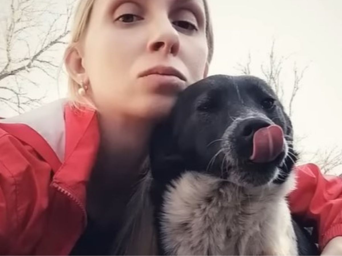 photo of woman with dog