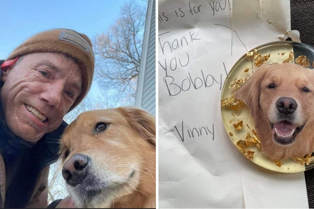 smiling man laughs with golden retriever