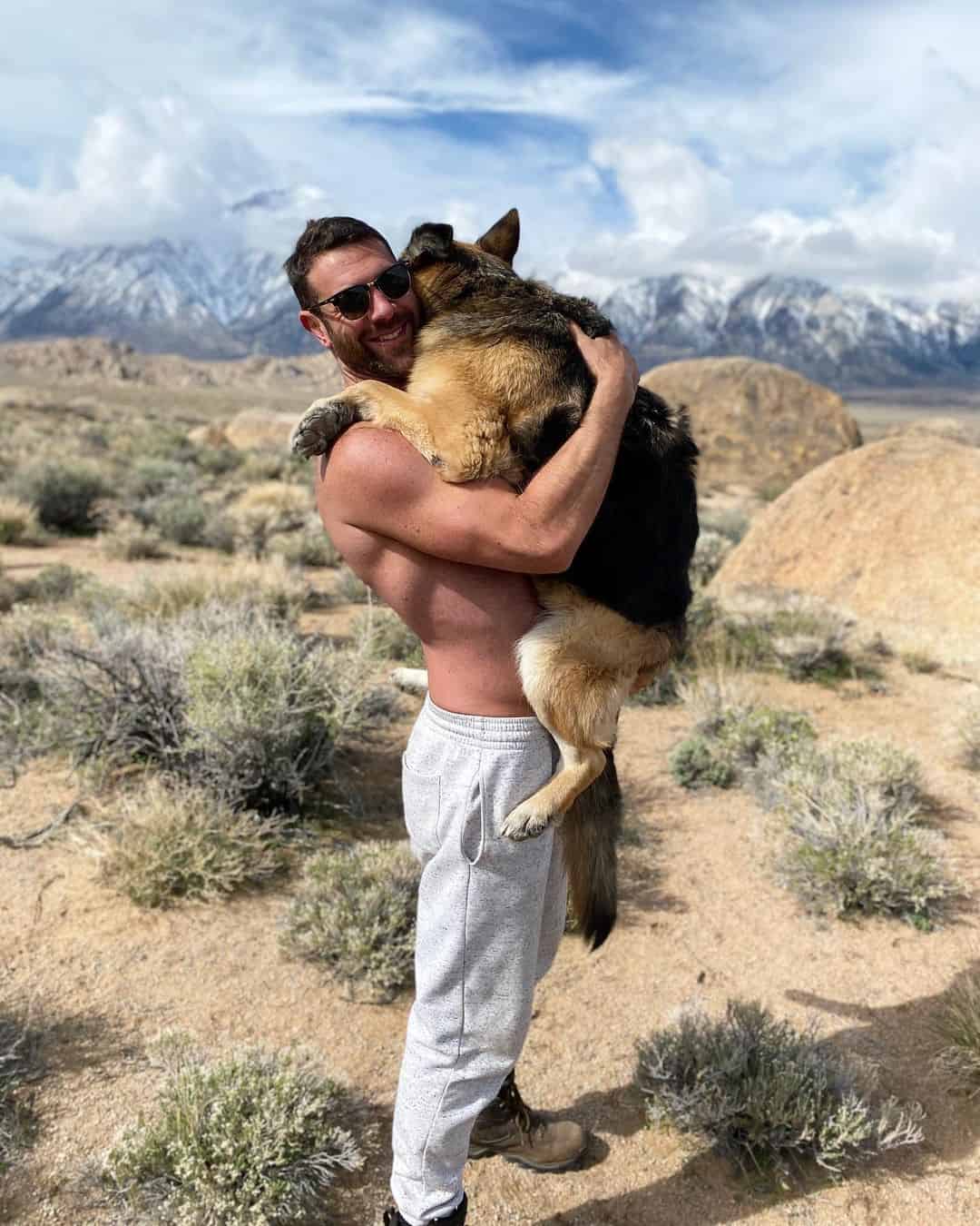 Tony's owner holding him