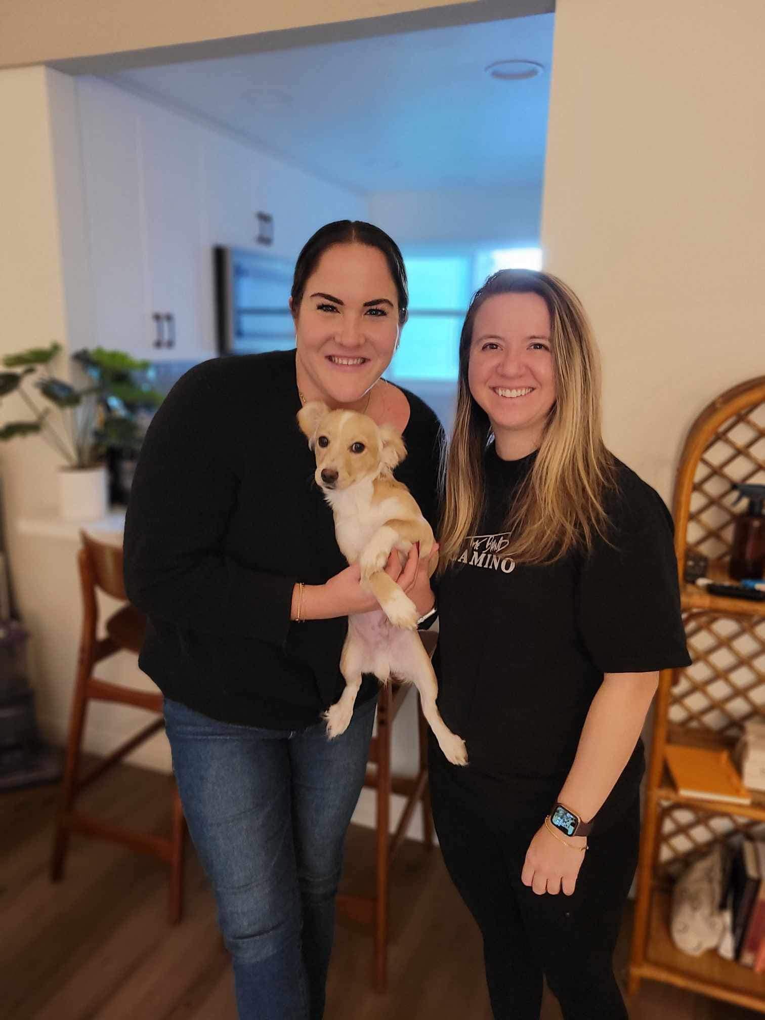 two girls and dog