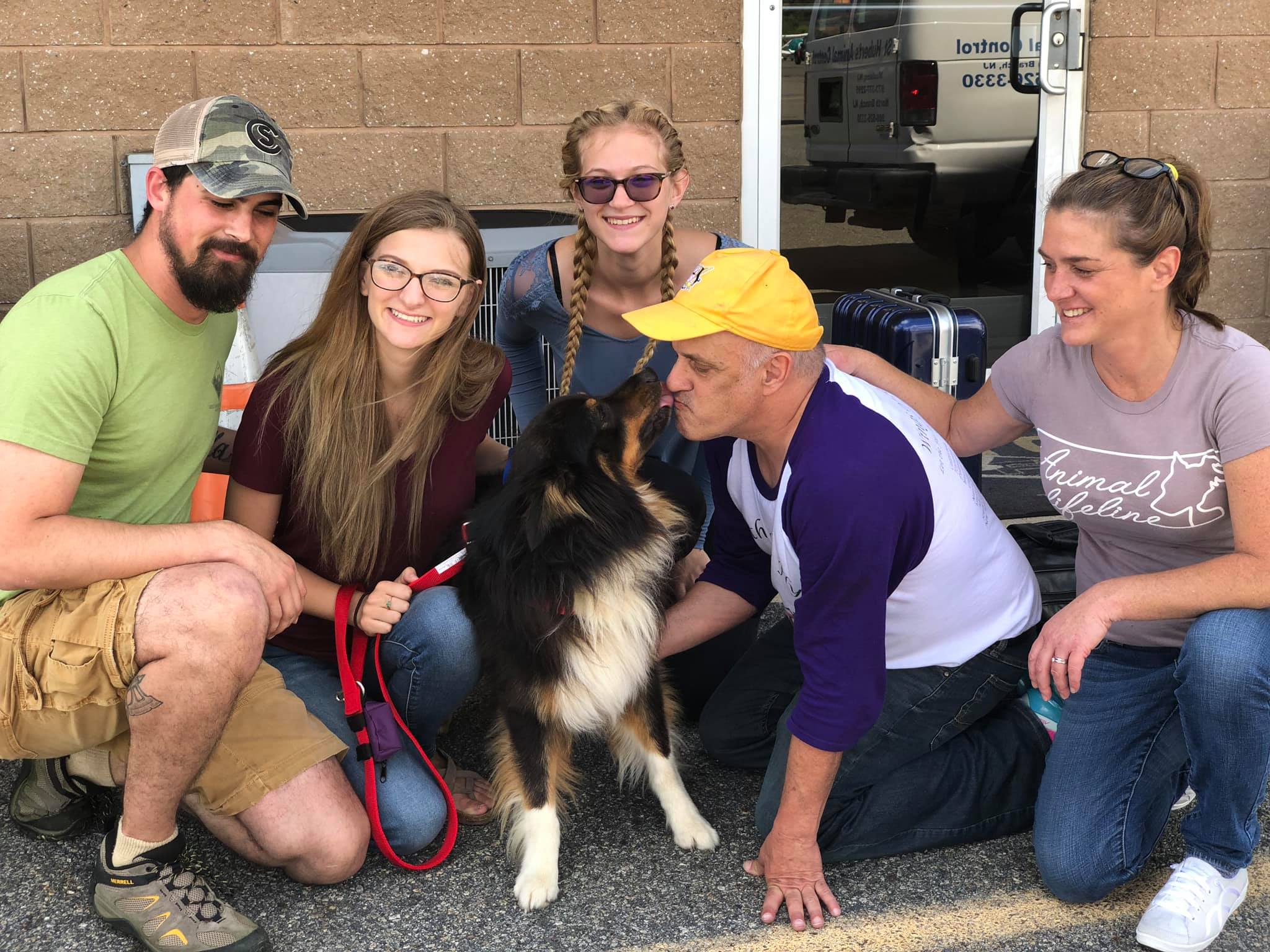 whole family and black dog