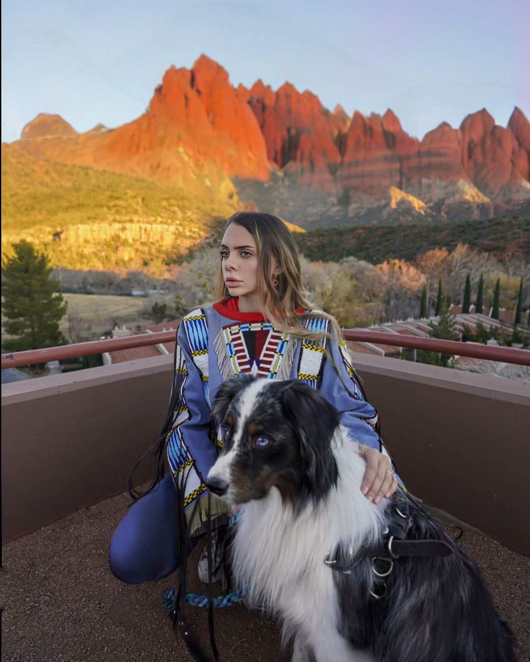 woman and dog posing for a photo