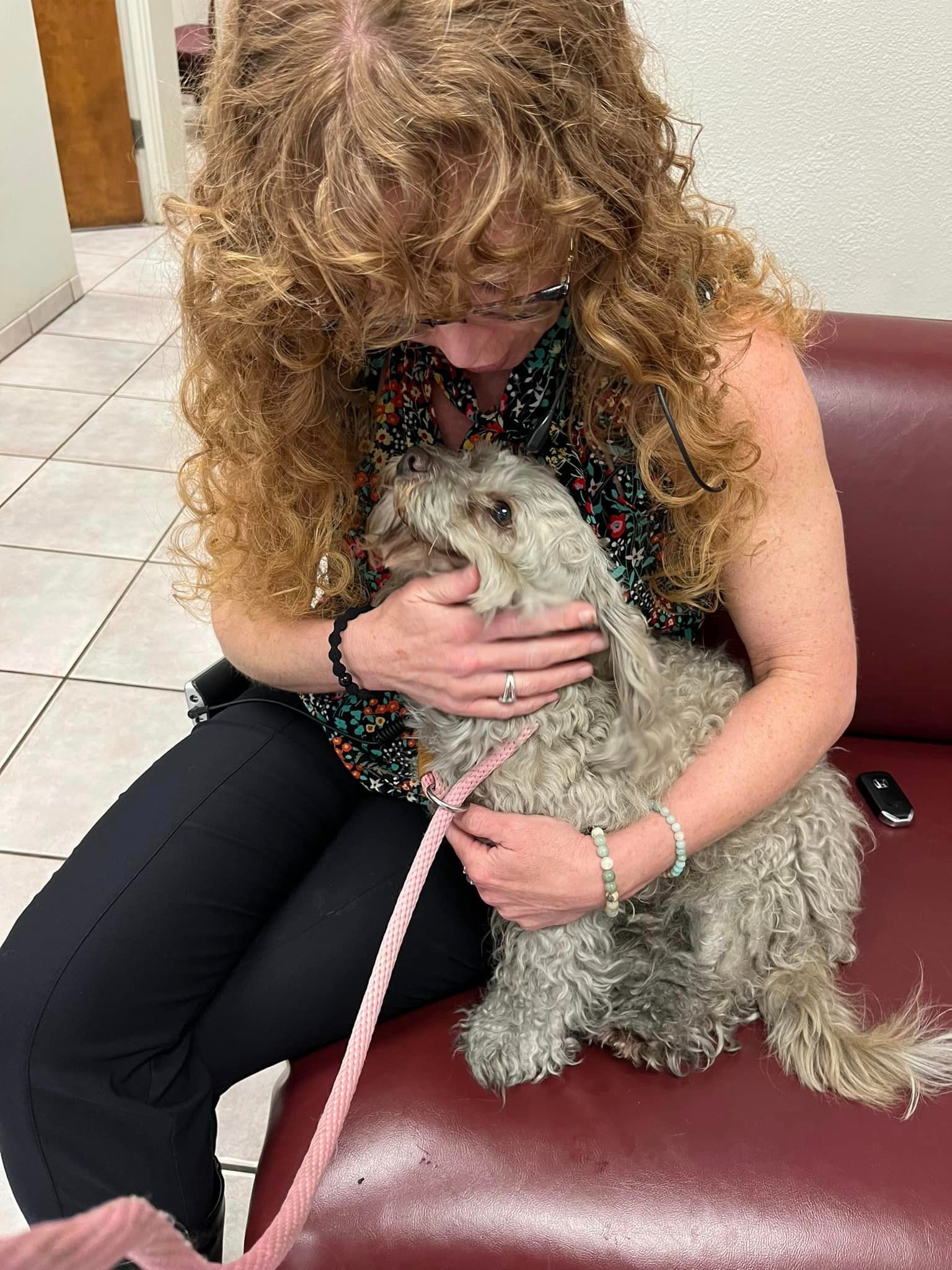 woman and dog with curly fur