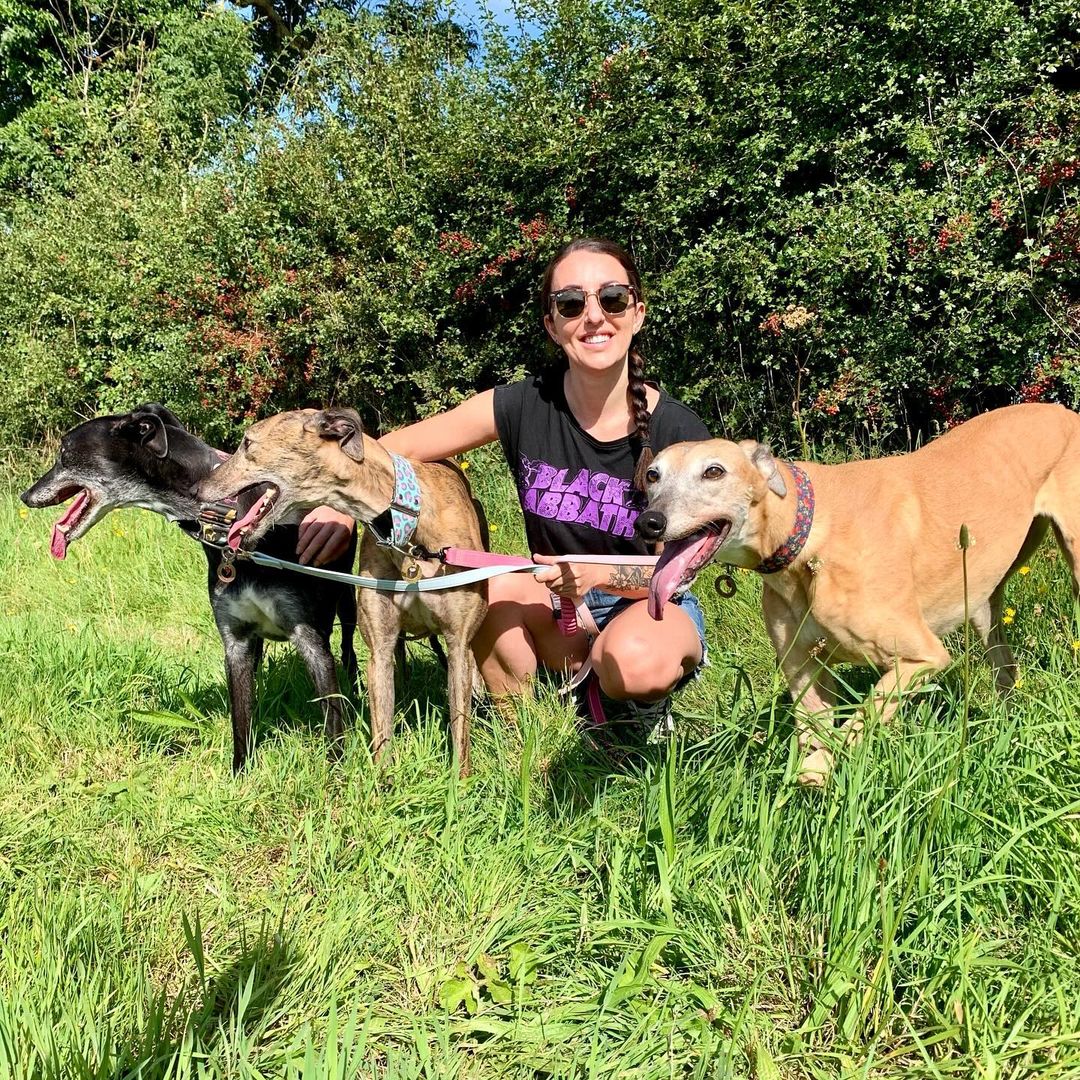 Woman and three dogs