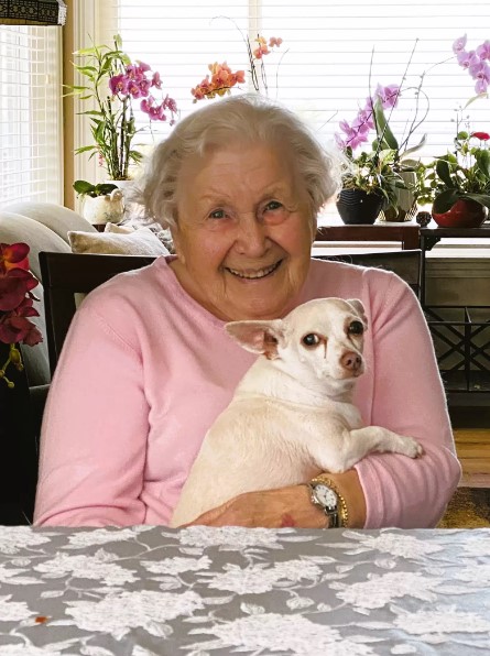 woman holding the adopted dog