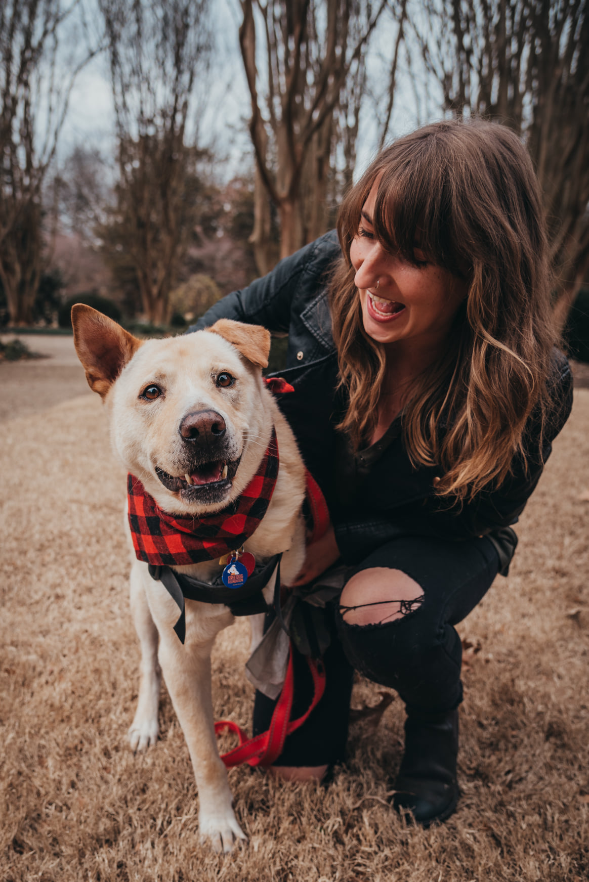 woman hugging her dog