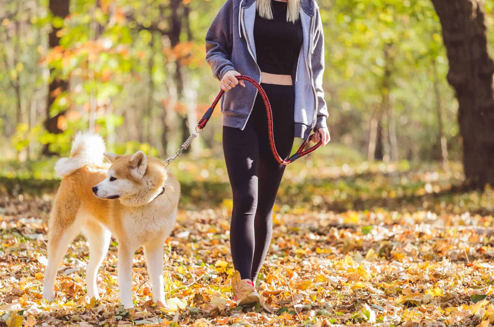 woman with her dog outside