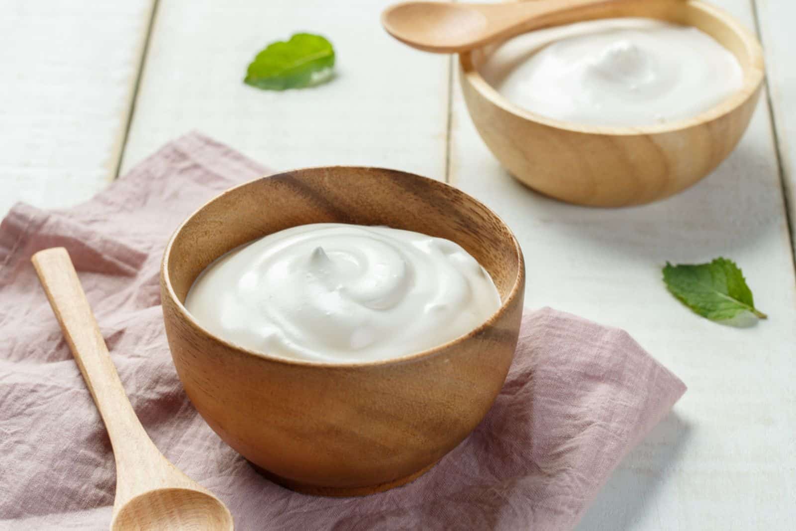 Yogurt in a wooden bowl