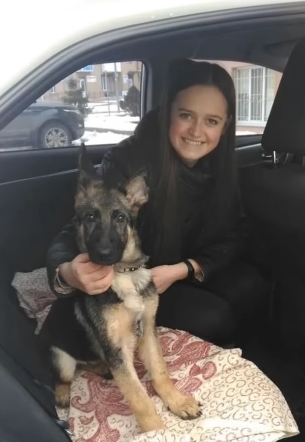 young lady and german shepher