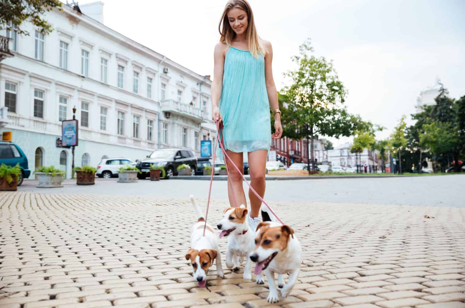 young woman with her dog outside