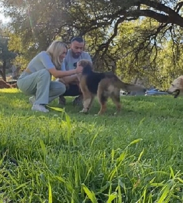 couple and dog