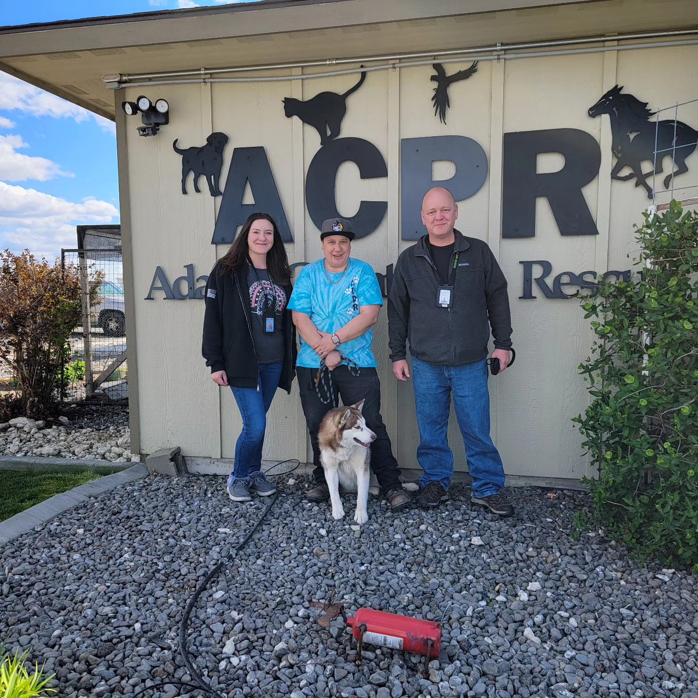 family posing with new dog