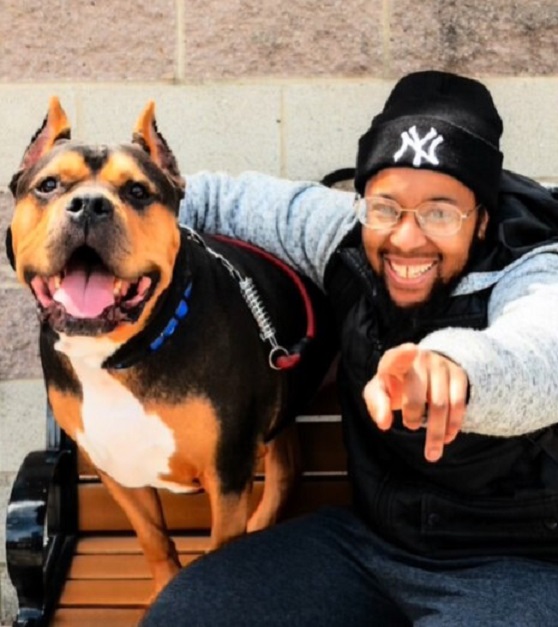 happy man reunited with his dog