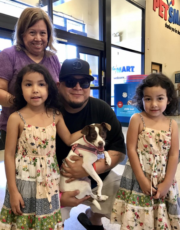 portrait of a happy family with a dog