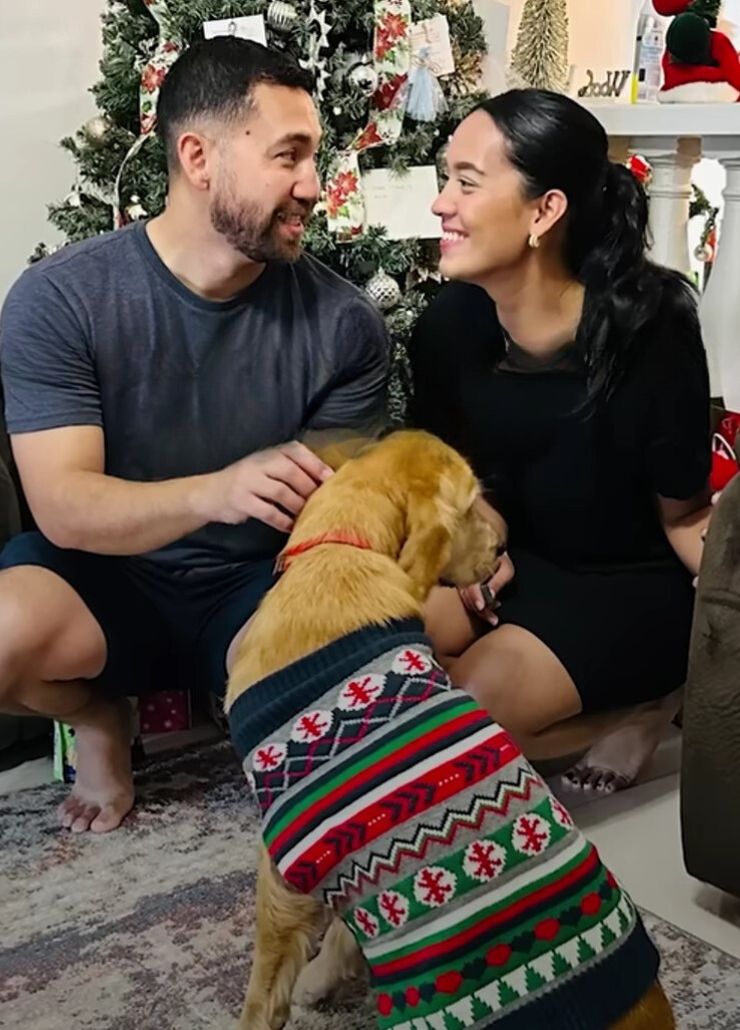 smiling couple with dog