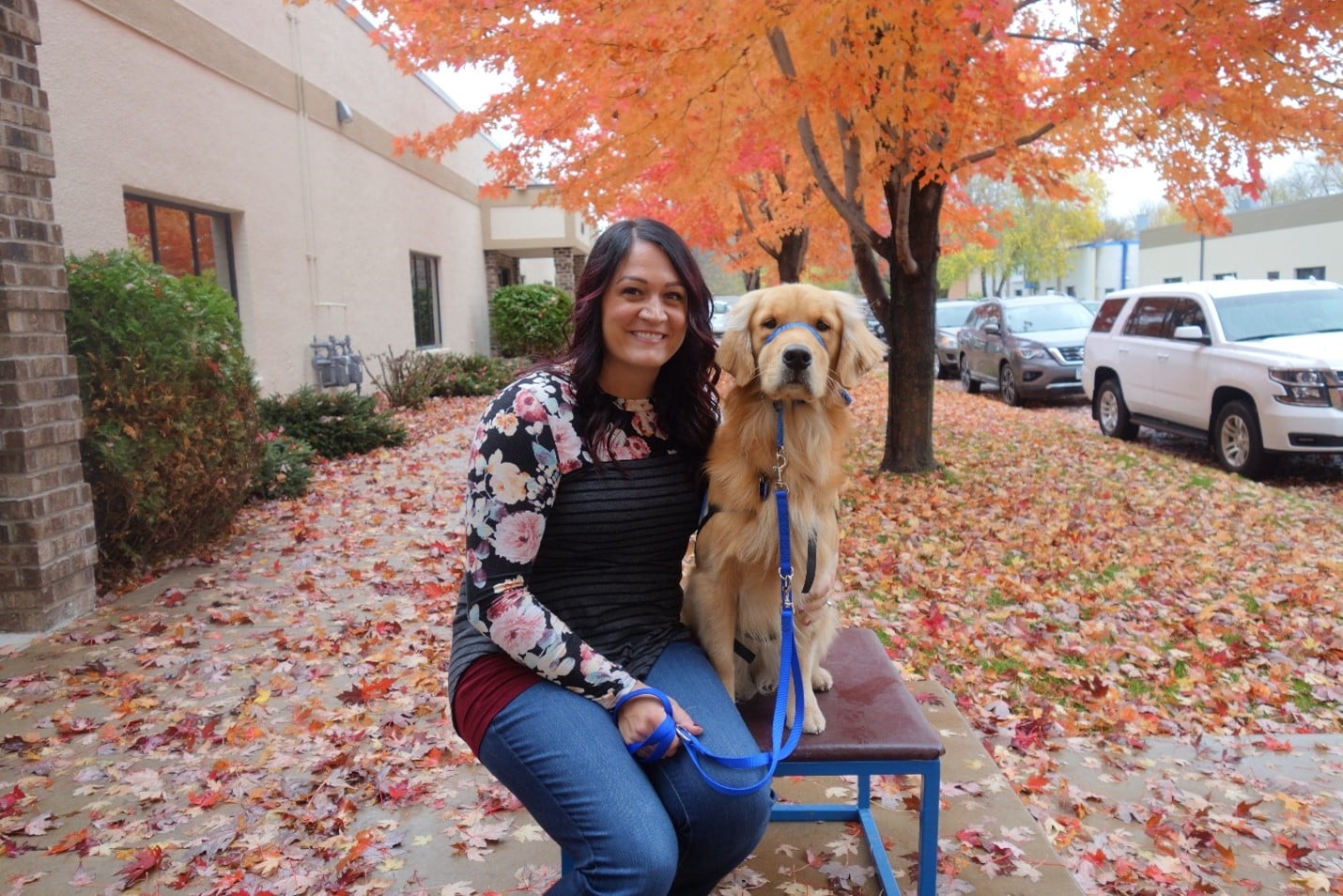 woman and dog in autumn