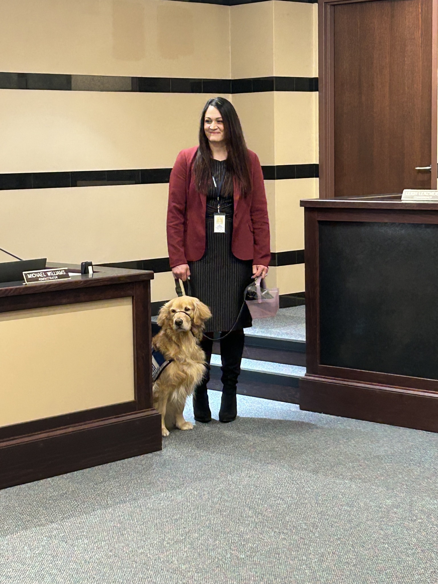 woman and dog in court