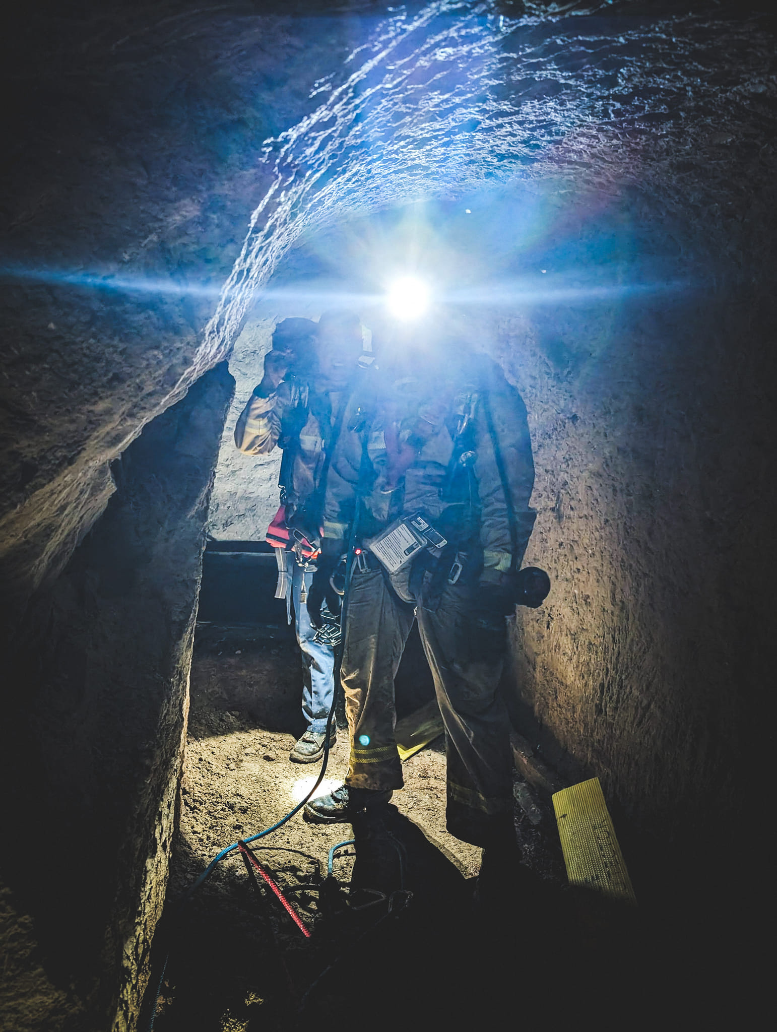 rescuers with head lights