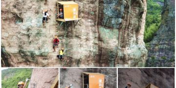 This small store hangs from a large cliff, providing water and snacks for rock climbers.