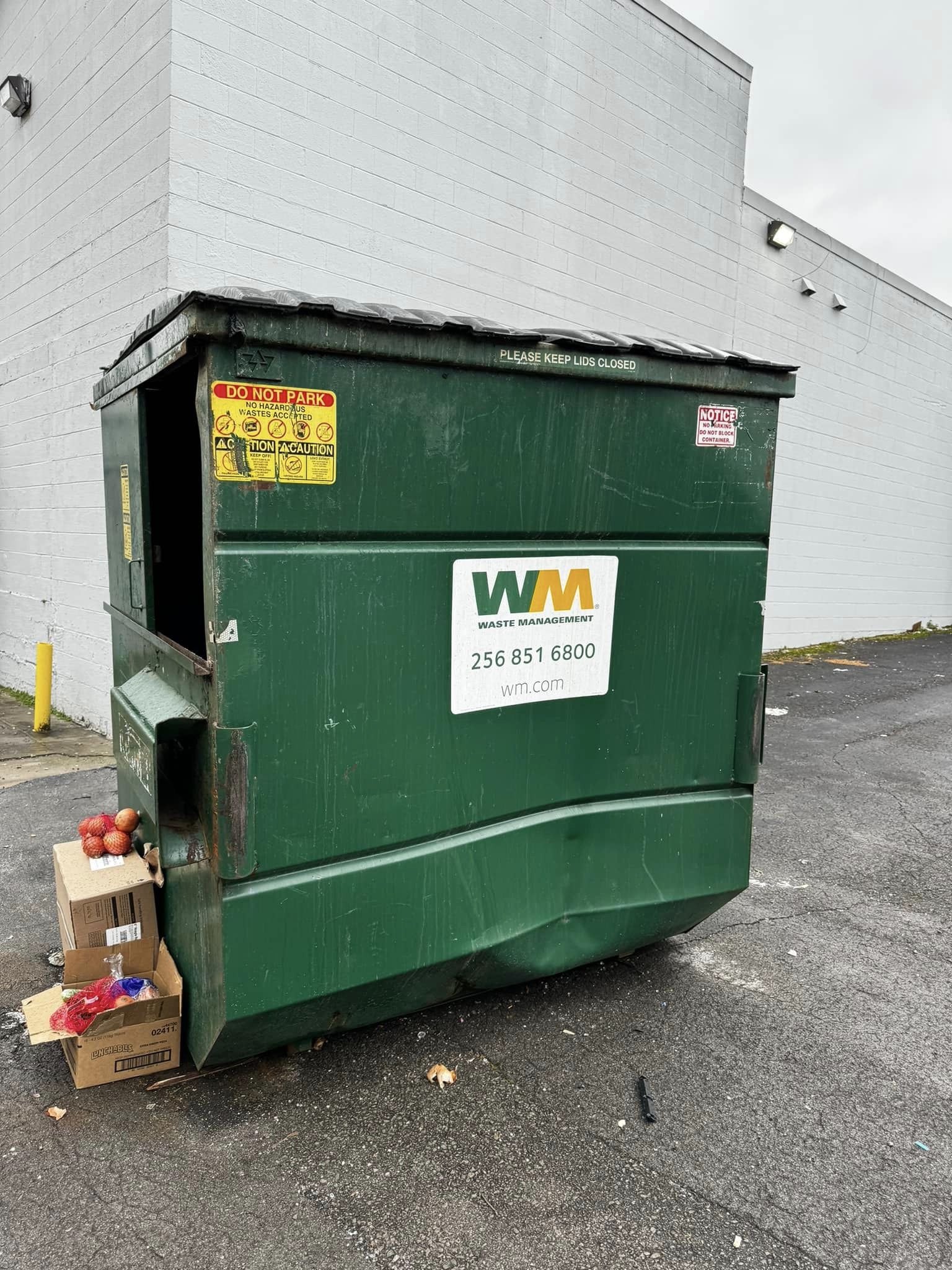 green dumpster outdoor