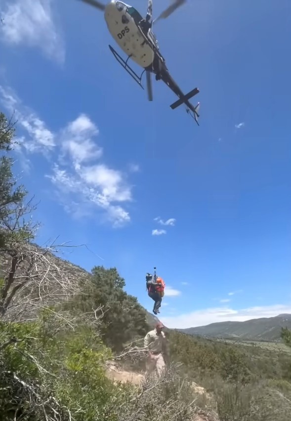 helicopter saving a man