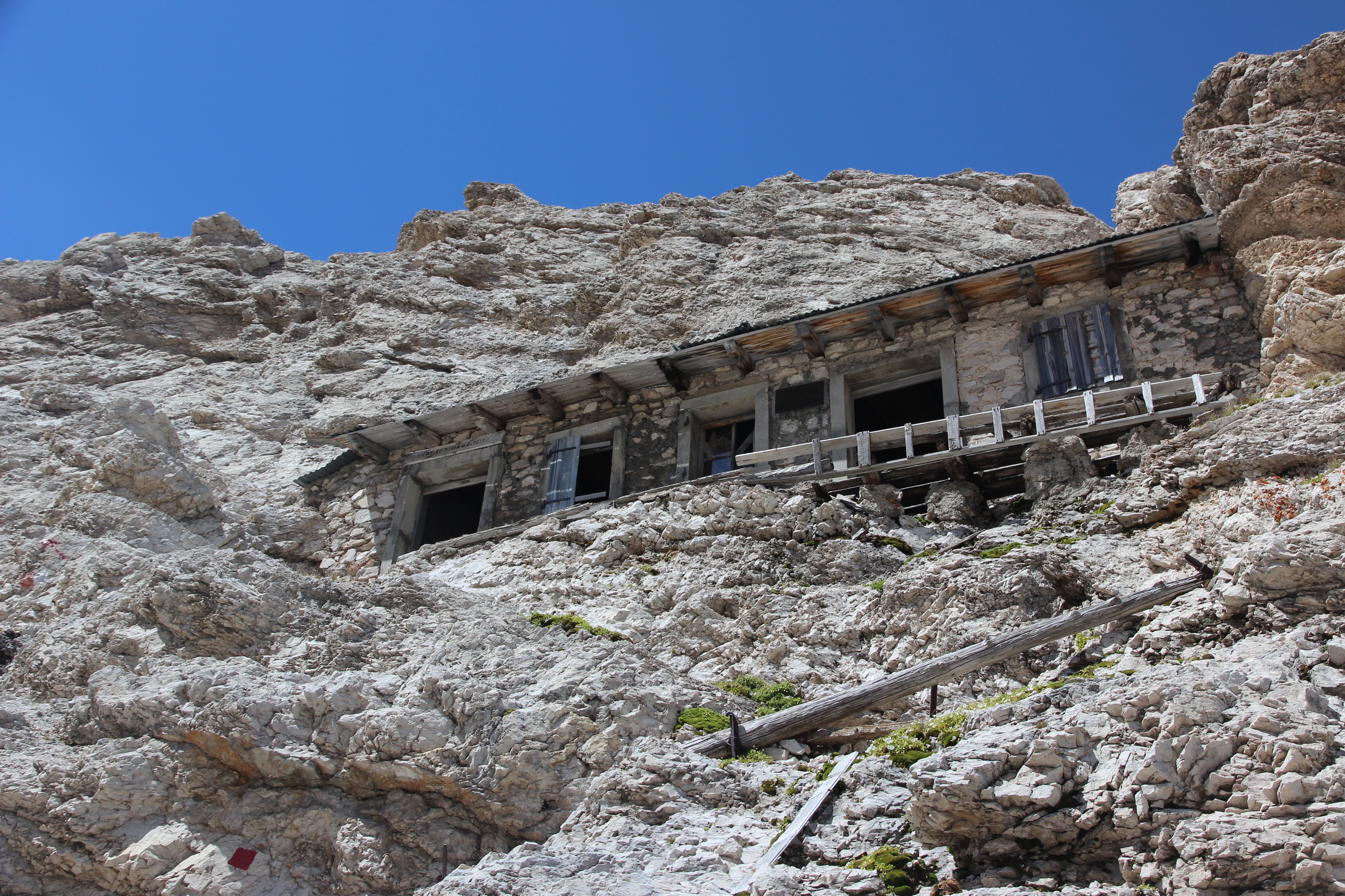 Mystery of world's loneliest house stuck on side of remote mountain range  that's lain empty for 100 years | The Irish Sun