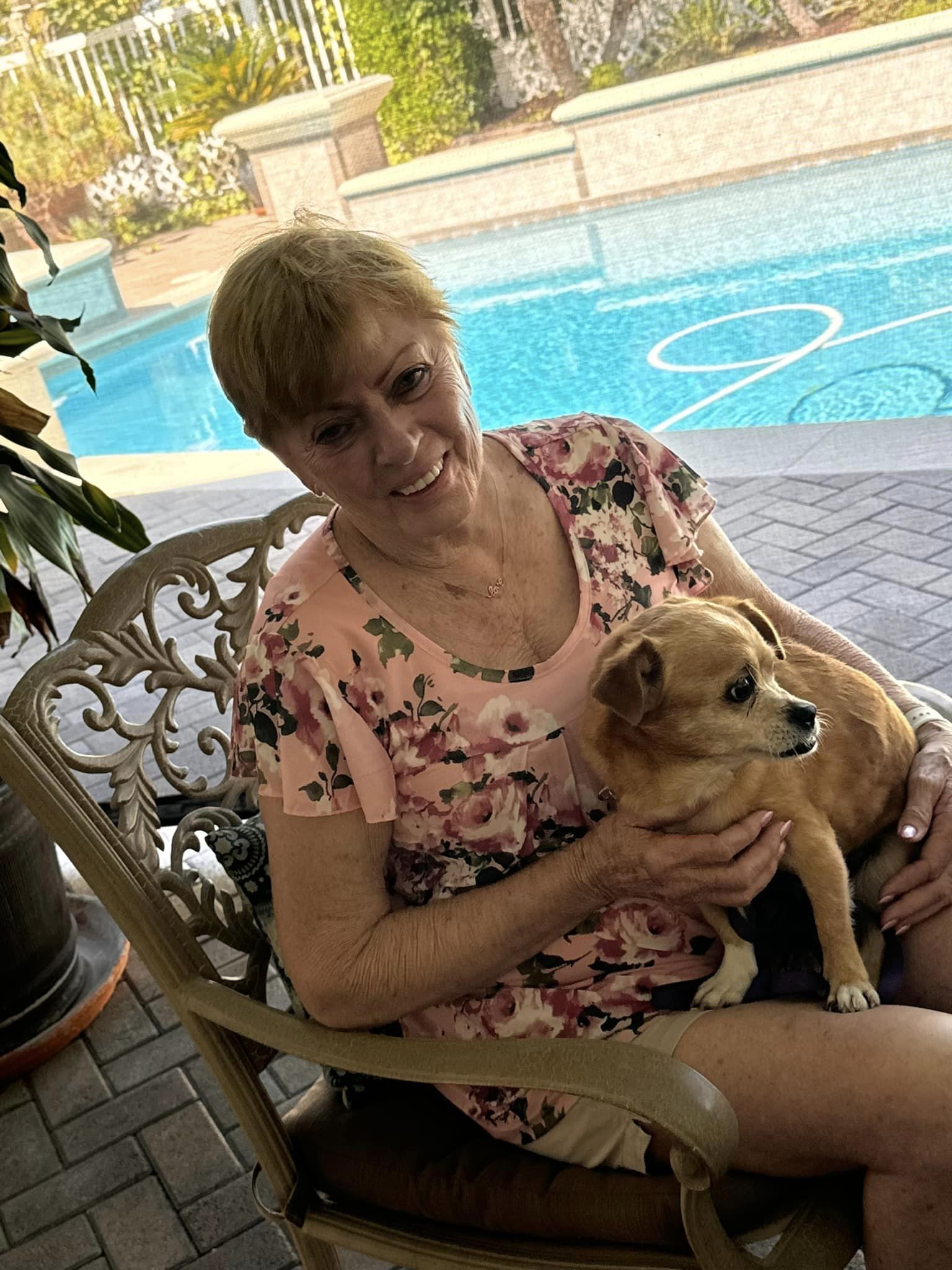 old woman and brown dog