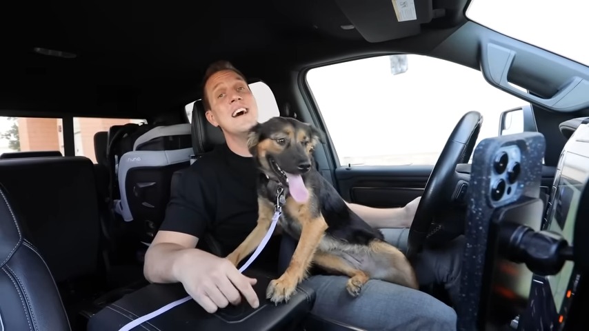 smiling man with dog