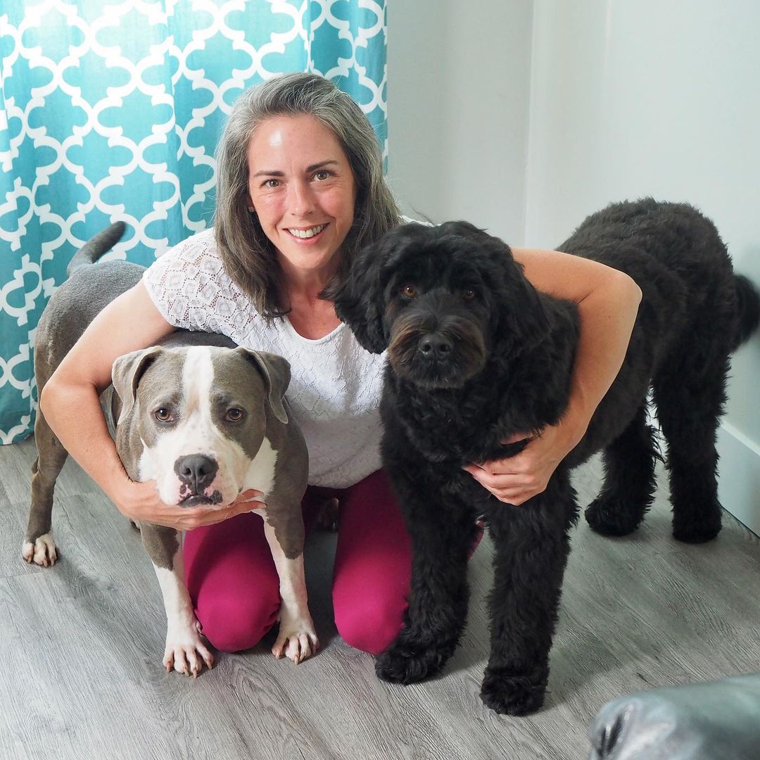 Woman and hers two cute dogs