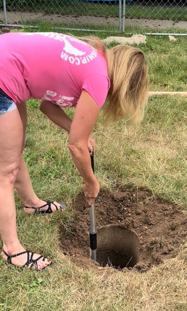 woman digging the hole